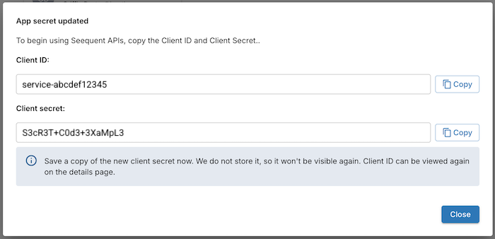 Dialog showing the new client secret after regeneration, with a copy button and a warning to save it